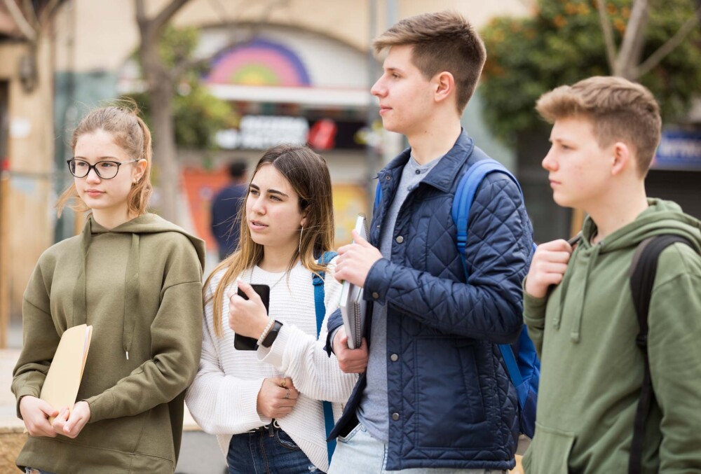 four youth outside